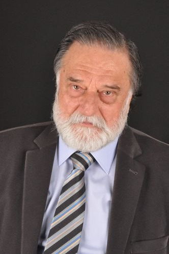 Erdoğan Sıcak as Şakir in Mr. Muhsin