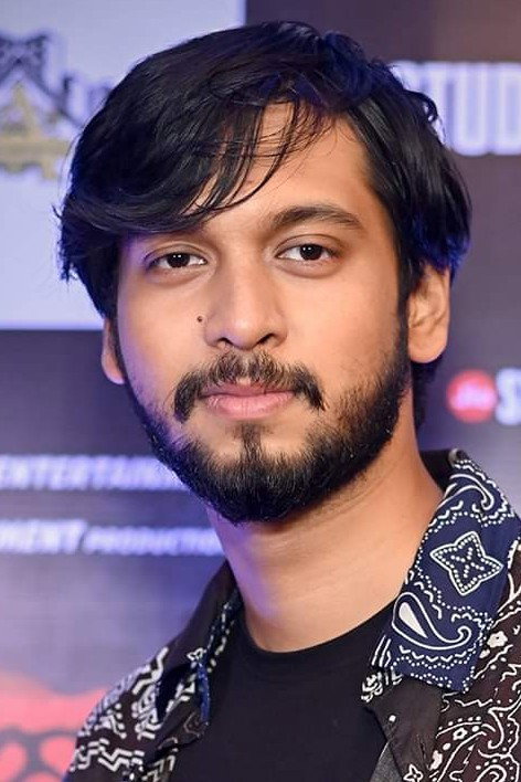 Ujaan Ganguly as Nabin Chandra Das in Rosogolla