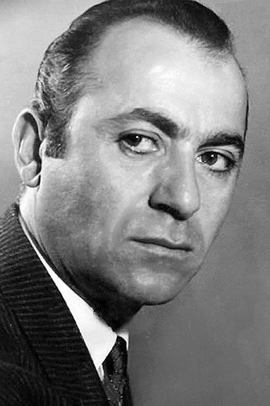 Arman as Monsieur in Night of Strangers