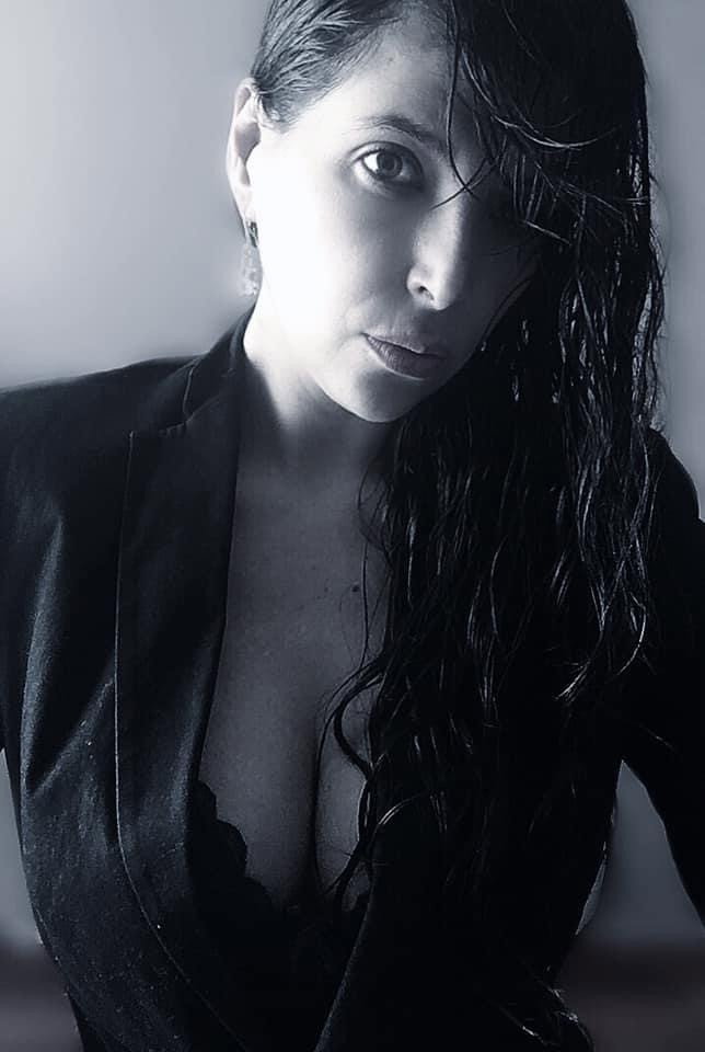 Mónika Rojas as Mujer del hotel in Demons at Dawn