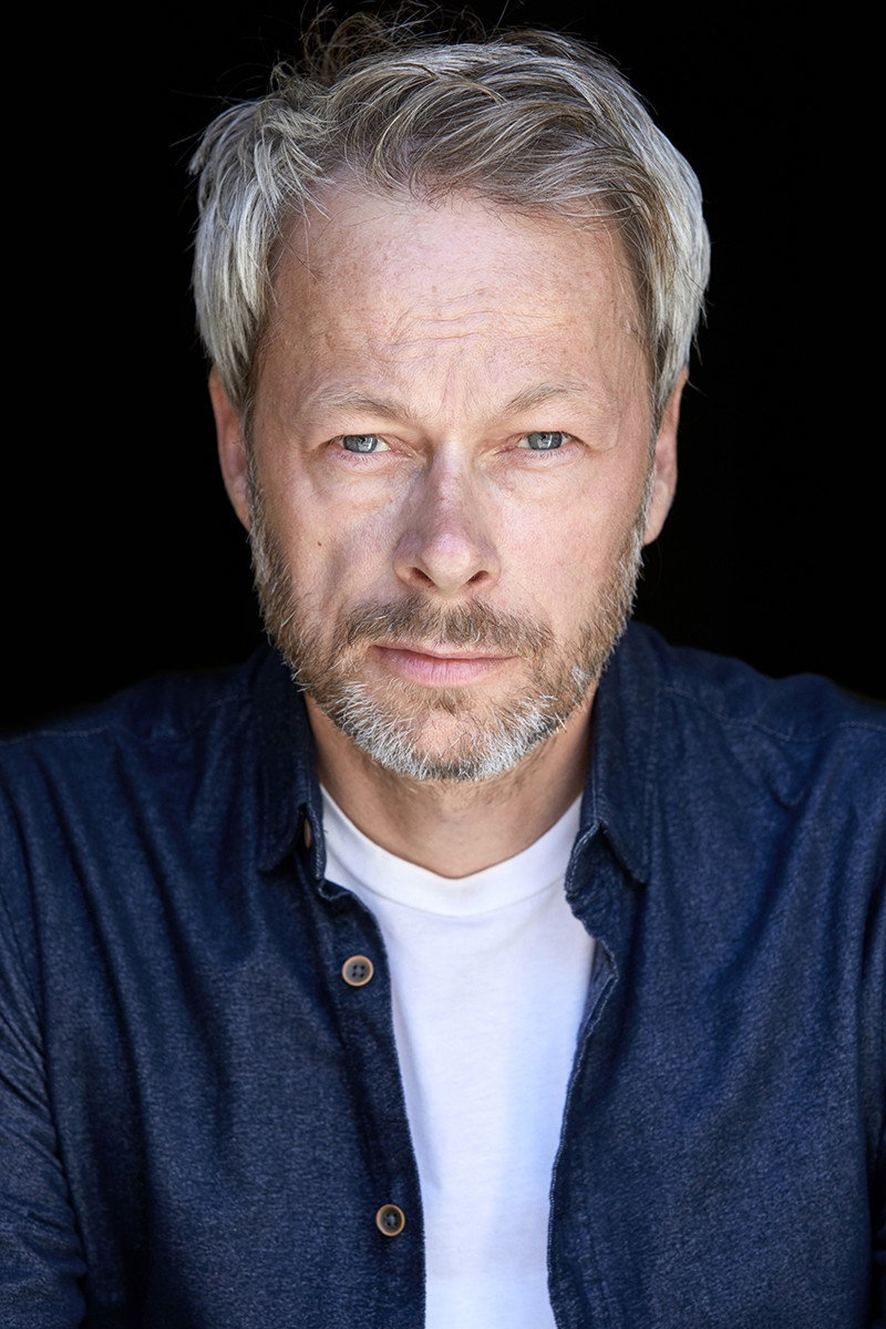 Lawrence Sheldon as Cafe owner in Me or the Dog