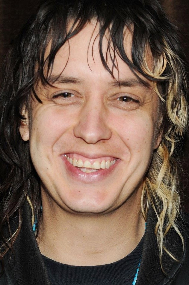 Julian Casablancas as Self - The Strokes (voice) (archive sound) in Meet Me in the Bathroom
