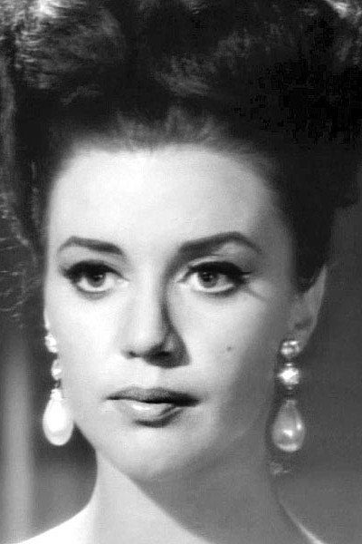Maura Monti as Camarada Tania in Your Excellency