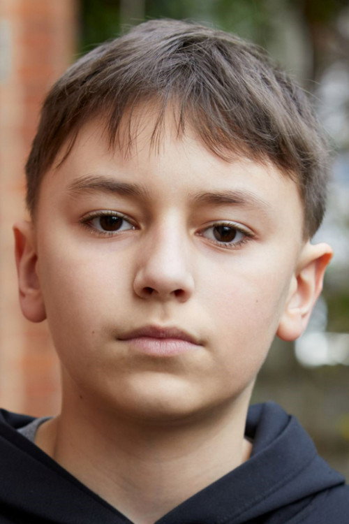 Lohen Van Houtte as Tom in Nuclear Family