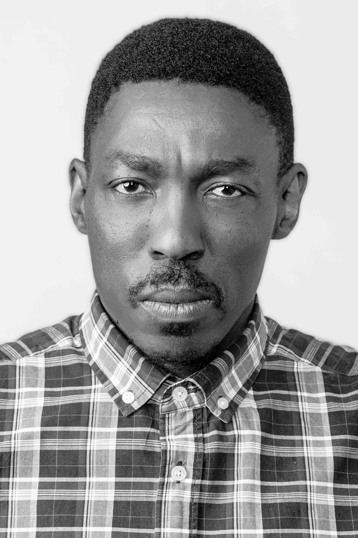 Ronnie Nyakale as Customer in The Call