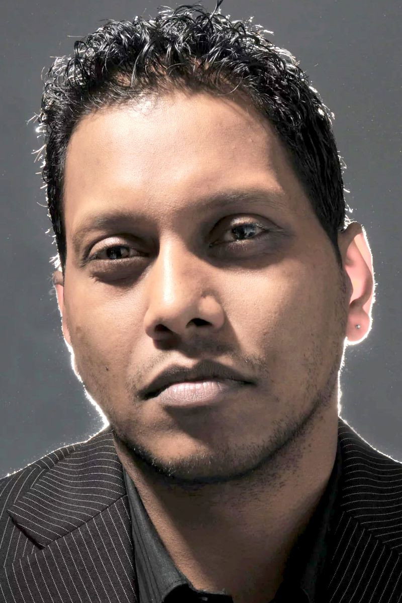 Oudesh Rughooputh as Apu in Conte de la frustration