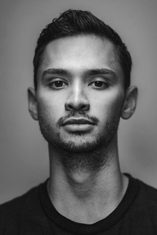 Gregory Lau as Misha in Revisor