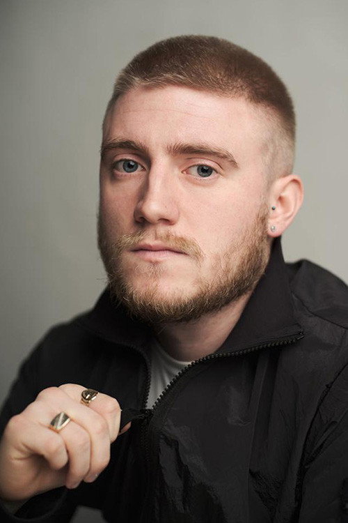 Ross Thompson as Carrick in Gun Running Grass