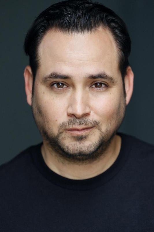 Amado Dehoyos as Phil in HIT