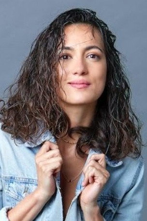 Mayra Hermosillo as Gloria in The Gringo Hunters