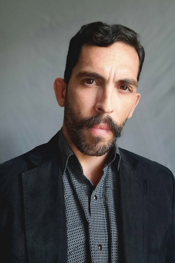 Chris James Rivera as Mac in Ghosts of Red Ridge