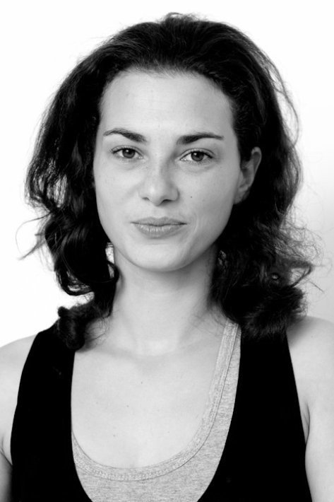 Alice Houri as Employee Commercial Court in Both Sides of the Blade