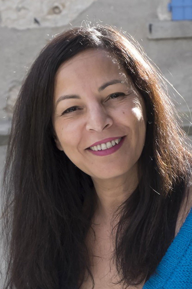 Fejria Deliba as Anna in Gang of Four