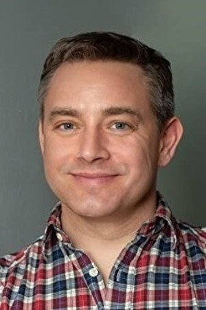 Simon Henderson as Clark in How to Fall in Love by Christmas