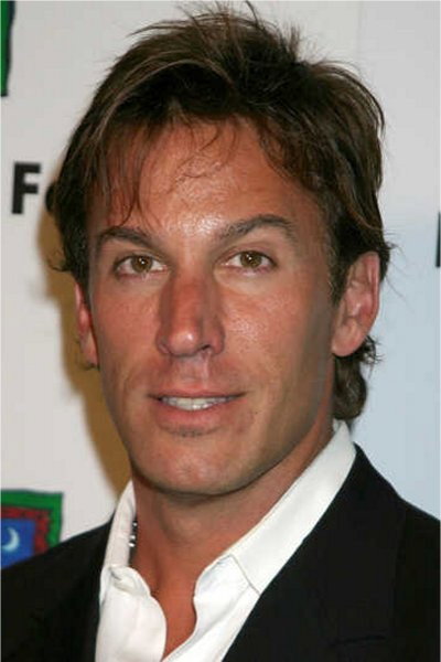 Dan Cortese as Chris in Traps
