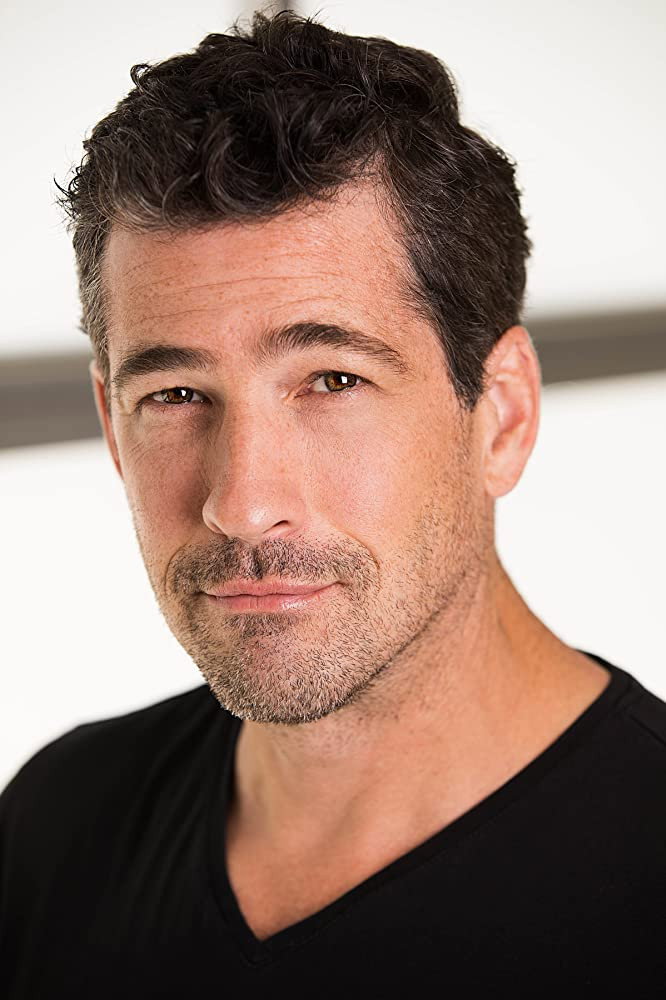 Nick Baillie as Scott Darwin in The Man in the Shadows