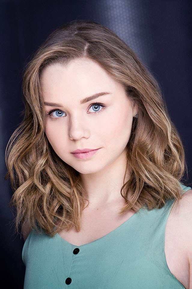 Niamh Wilson as Debra in Debra!