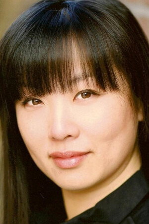 Christina Tam as Christine (voice) in The First Time I Never Met You