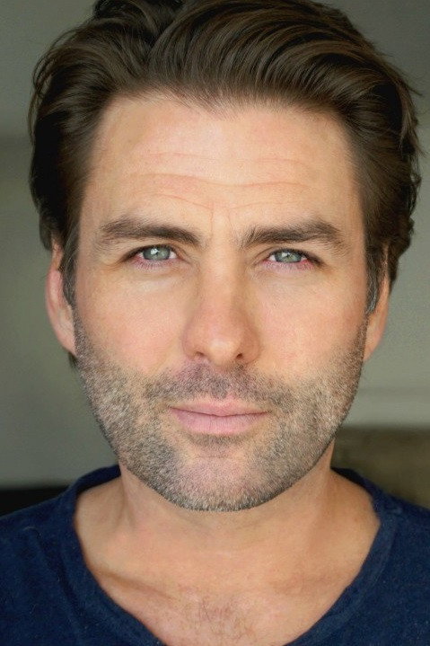 Kieren Hutchison as Myles in Merry Ex-Mas