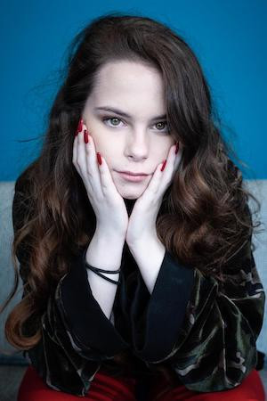 Amber Havard as Kris in Bull