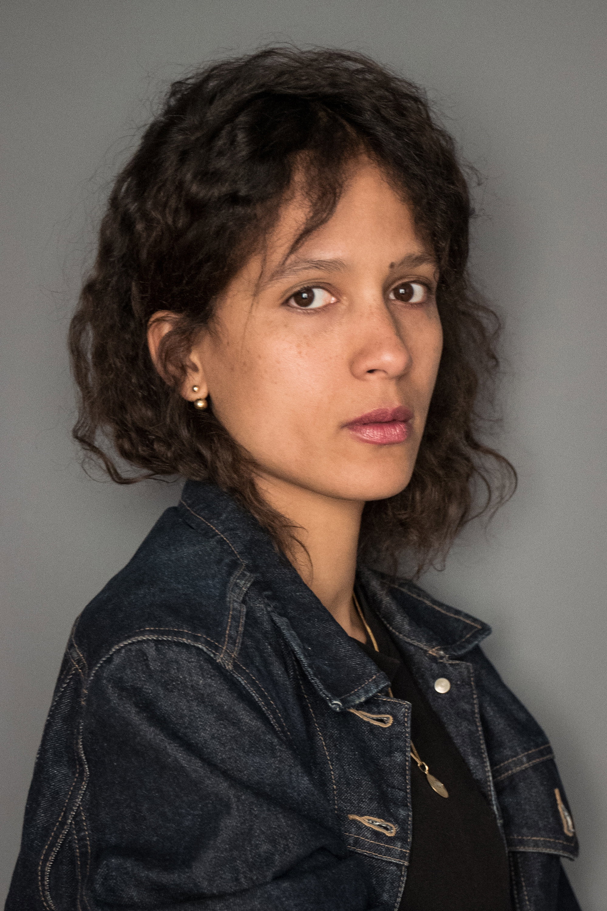 Mati Diop as Gabrielle in Both Sides of the Blade