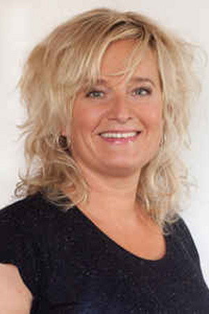Martine Sandifort as Maxima/Irma Sluis in RTL Exclusief