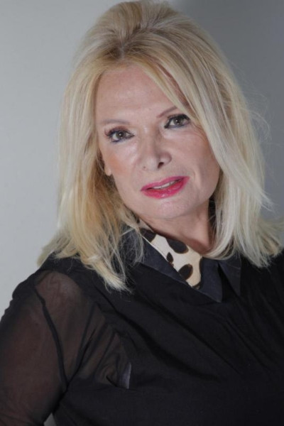 Joelle Hélary as Lulu the brothel keeper in Eject