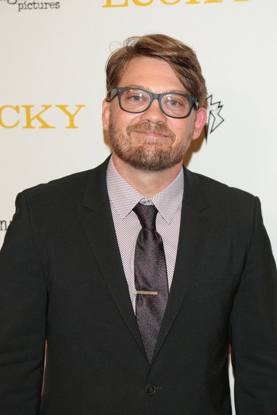 Logan Sparks as Photo Subject / Line Waiter in Validation