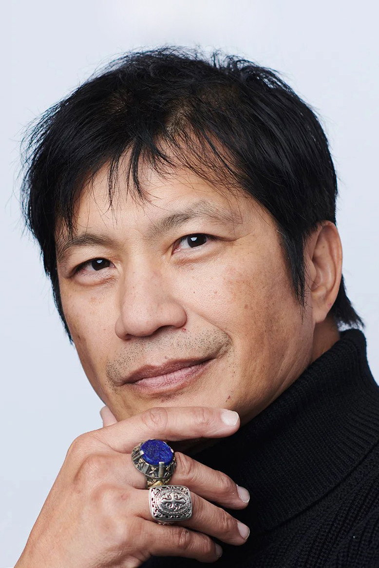 Dustin Nguyễn as Troy Poon in Finishing the Game: The Search for a New Bruce Lee