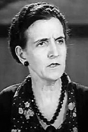 Martha Mattox as Miss Labo in Conflict