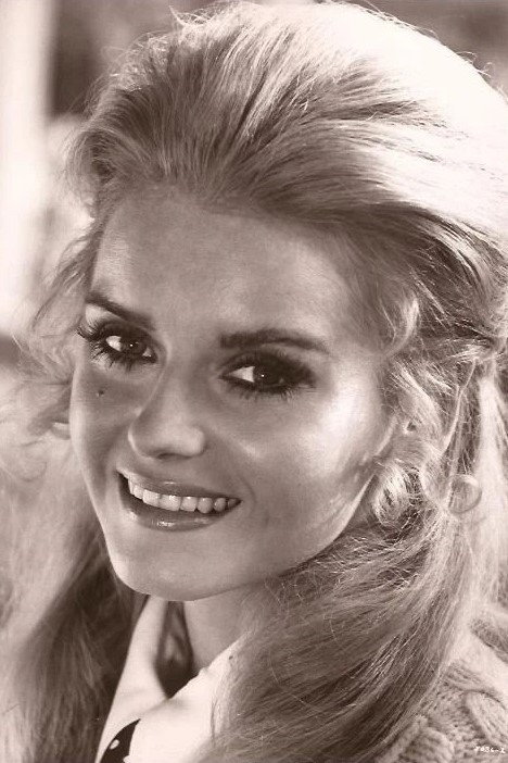 Sharon Farrell as Mrs. Mancini in Can't Buy Me Love