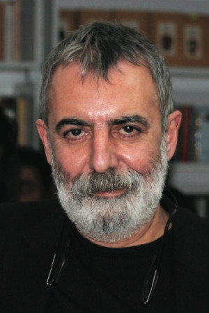 Orhan Alkaya as Fehmi Şekercizade in Love Once Again
