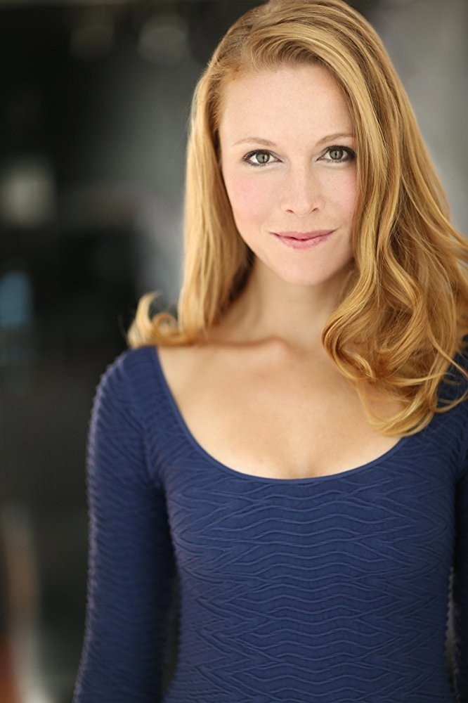 Julie Lynn-Mortensen as Nola Trent in The Julius House: An Aurora Teagarden Mystery