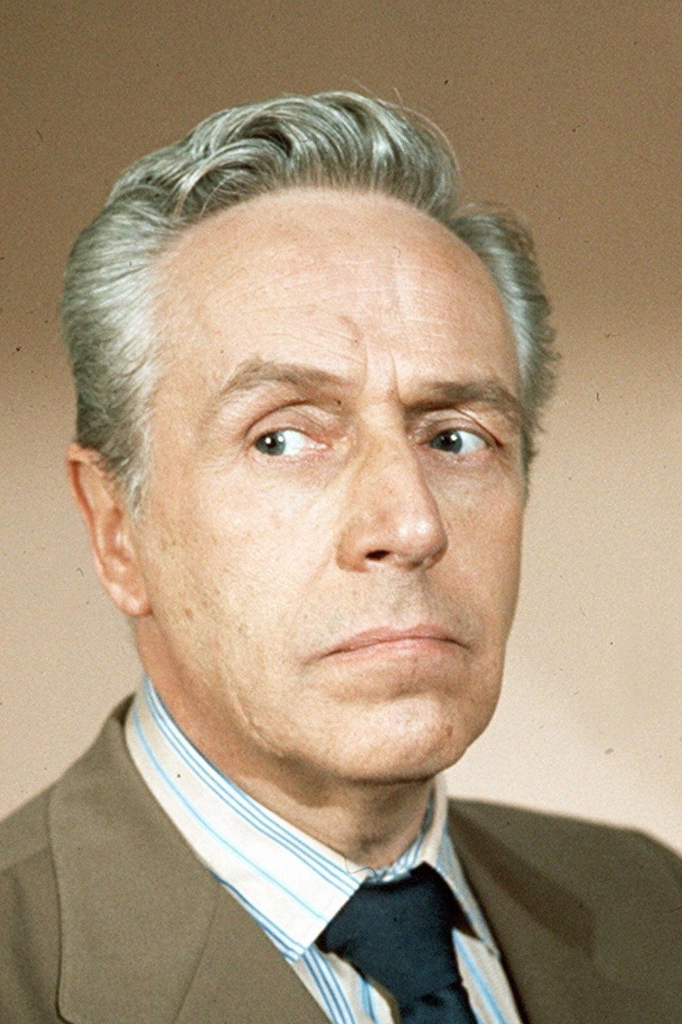 Noel Willman as Chief of Police in Across the Bridge