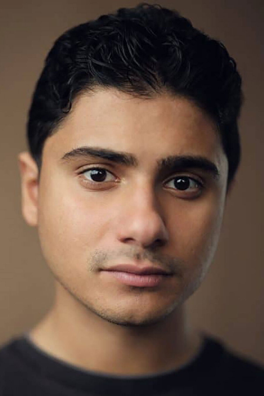 Bilal Hasna as Eddie Sood in Christmas Karma