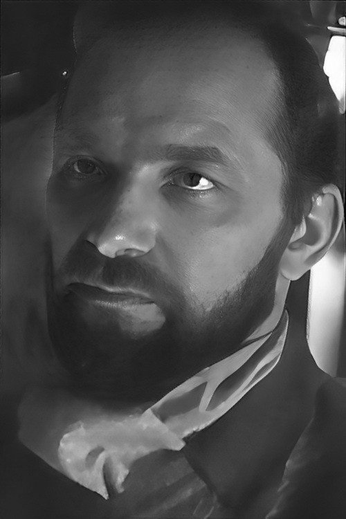 Vidas Petkevičius as School head-master in The Poet