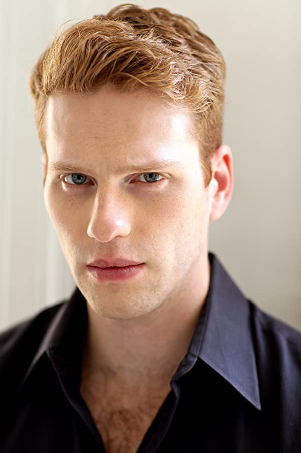 Grant MacDermott as Tom in Iris