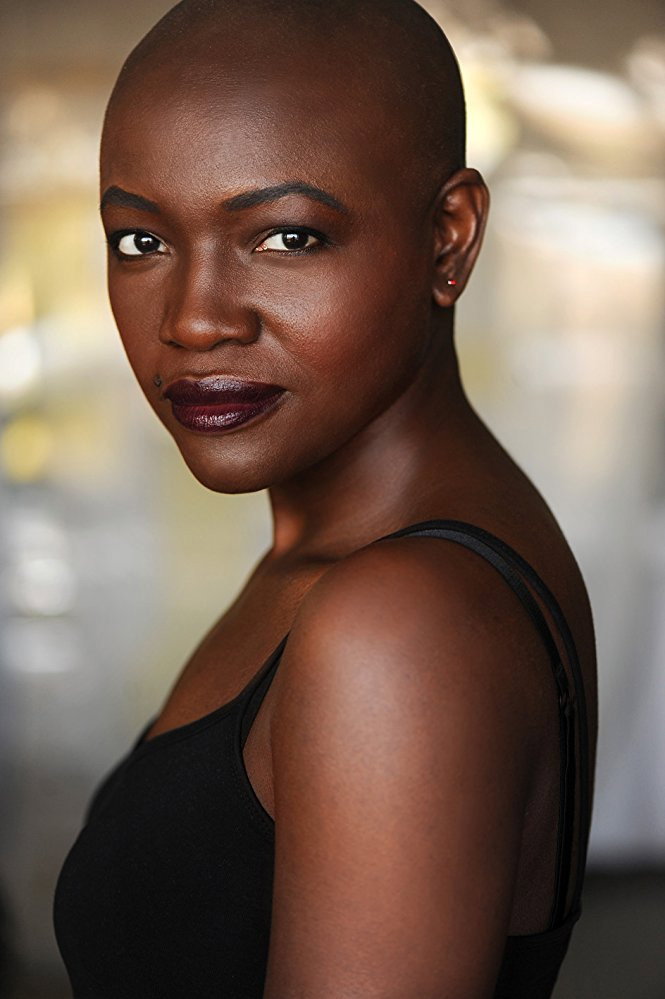 Constance Ejuma as Bola in Neighborhood Alert