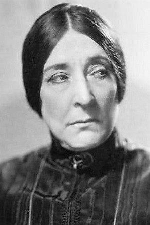 Emily Fitzroy as Mrs. Conger in Foreign Devils