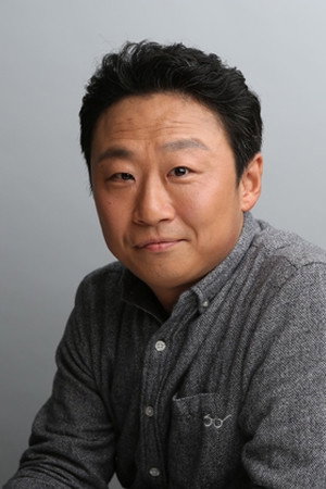 Takashi Nomura as Security Guard Jiro Suzuki in Suicide Club