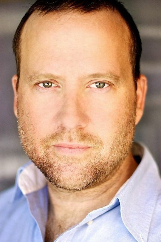 Lawrence Moran as Detective Wes Hensley in Murder Among Friends