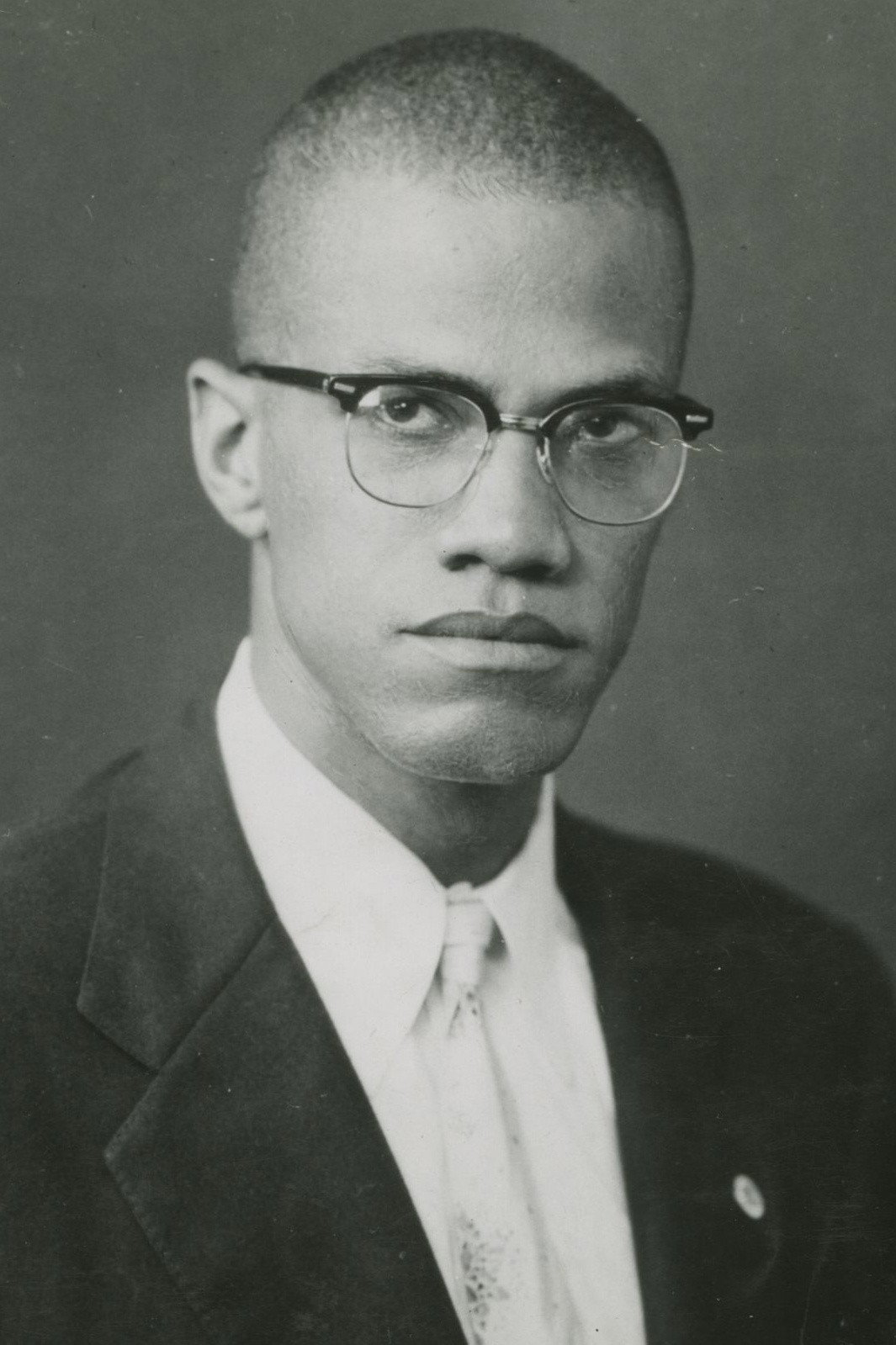 Malcolm X as Self (archive footage) in What's My Name | Muhammad Ali