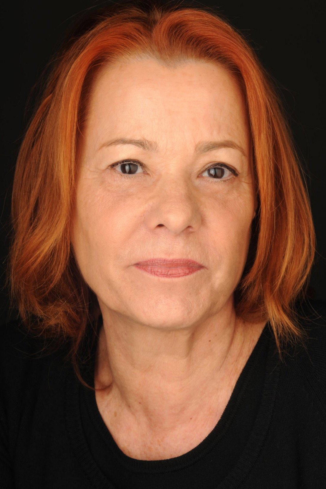 Tina Barbosa as Mãe in Homem Leão