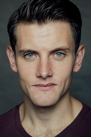Samuel Holmes as Christopher Belling in Curtains