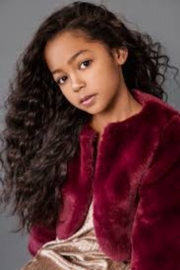 Jordyn Raya James as Ami McKellan in Family Reunion