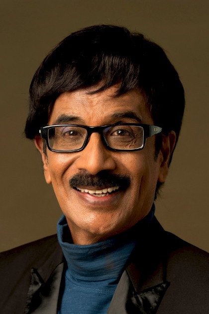 Manobala as School Head Master in Aruvam