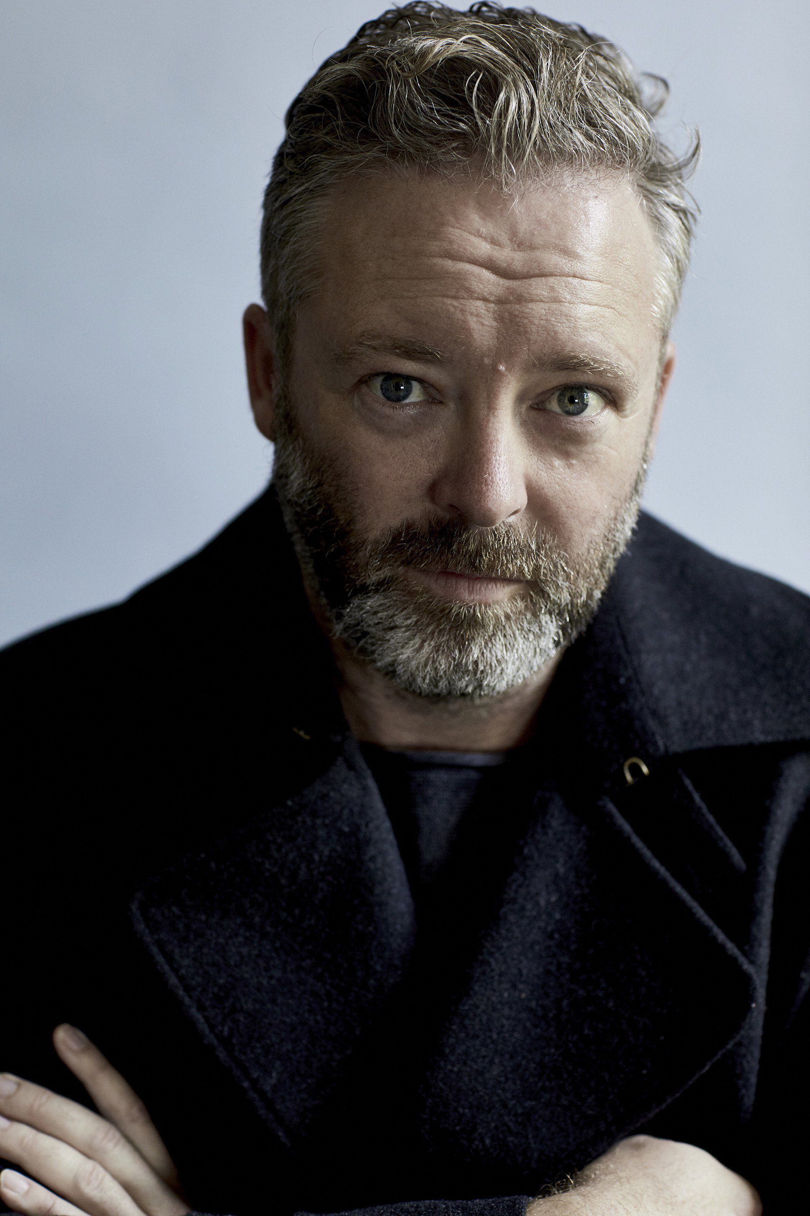 Brett Cousins as Tom Baker in The Whistleblower