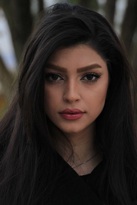 Sahar Heidary as The Secretary of Farbod in Liberation