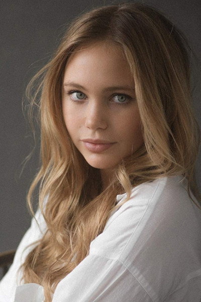 Tallulah Evans as Lily Riser in Girl Taken
