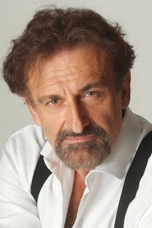 Massimo Venturiello as Enrico in The Wicked